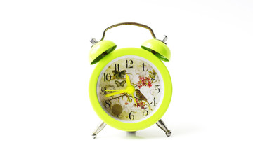 Green Alarm clock isolated on white background,