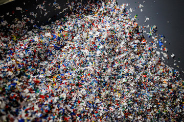 recycled plastic bottles and waste at the plant