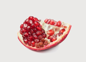 Red ripe pomegranate on a white background
