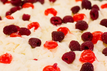 Whipped cream with fresh raspberries and jam