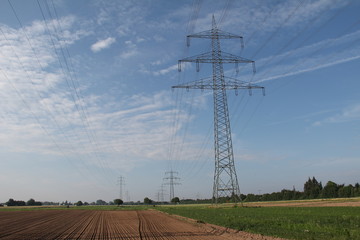 Transmission line on background of blue sky