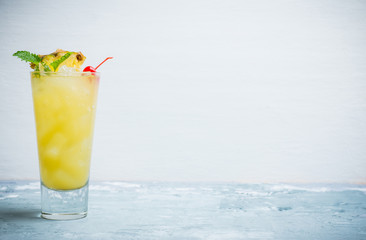 Sweet cocktail with pineapple and rum. Selective focus.