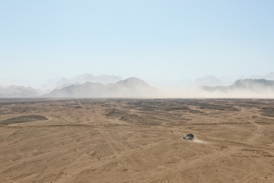 Fototapeta Landscape of desert in Egypt with jeep for safari