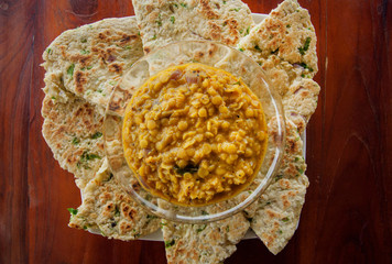 Indian food for fast snack, roti bread and vegetarian dal made from lentils or beans. Also food...