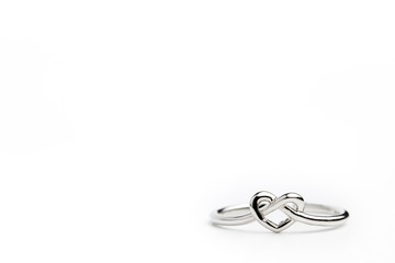 Heart shaped ring placed on a white background. The concept of love or marriage. Copy space can be used to write articles about Valentine's Day.