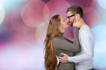 happy young couple looking at each other