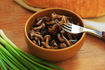 marinated mushrooms in a cup