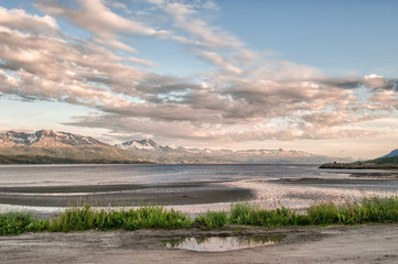 Obraz premium View from Bjerkvik during a Nordic summer night towards Ofotfjord and Narvik. This fjord was the scene for several naval battles during World War II.