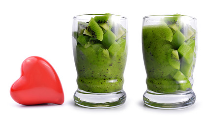 Delicious fruit smoothies from fresh kiwi in a glass isolated on a white background.