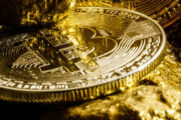 Golden bitcoin coin and mound of gold bitcoin cryptocurrency business