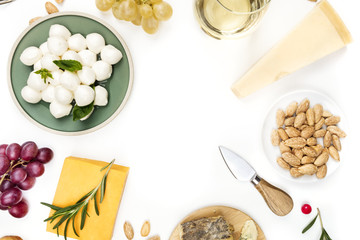 Selection of cheeses on white with copy space