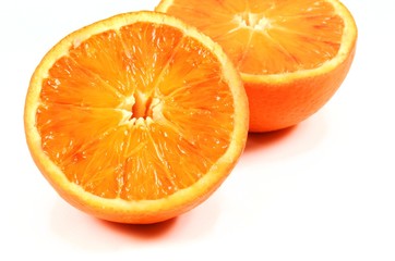 Orange fruit sliced juicy isolated on white background. Closeup.  Healthy eating concept.