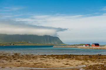 Coast landscape at Ramberg on Lofoten islands in northern Norway. Lofoten is a popular tourist destination.