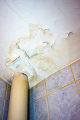 Ceiling in need of repair. On the ceiling, dirt and cracks