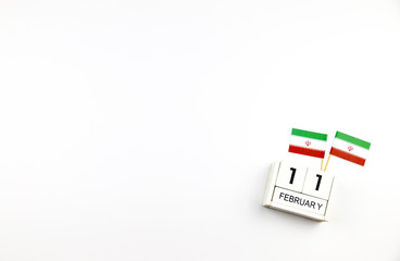 Fototapeta na wymiar February 11 Wooden calendar Concept independence day of Iran and Iran national day with space for your text.