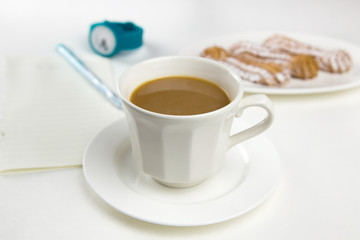 Morning latte on a white background with turquoise accents