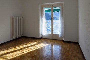 White room with lake view. Nobody inside