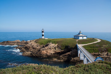 Fototapeta na wymiar Lighthouse of Pancha Island in Ribadeo, Galicia, Spain. 