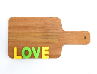 love letters on a cutting board