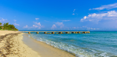 Pier on one of West Bay's beach in the Caribbean, Grand Cayman, Cayman Islands