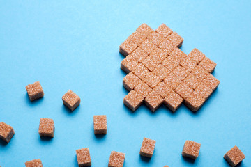 Reed brown sugar folded in the shape of heart of pixels. I love sugar