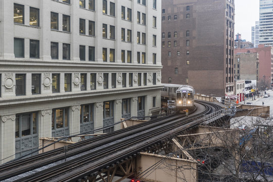 A subway train starting to round a corner © Richard