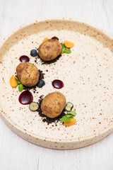 Delicious creative cakes made in the form of real raw potatoes