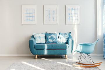 Turquoise couch in daily room