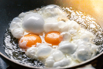 Cooking fried egg blur