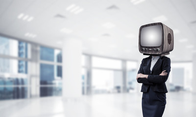 Business woman with old TV instead of head.