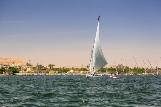 Falukas sailboat on the Nile river near Luxor, Egypt