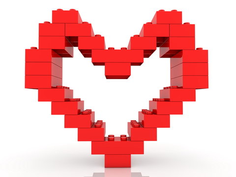Heart construction of toy bricks in red color