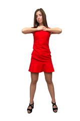 Happy surprised girl in red dress in stockings and in high heels shoes is standing is posing and is dancing on isolated on white background.