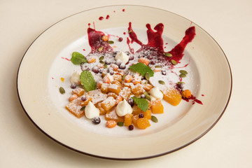 Tasty dessert from pumpkin sea-buckthorn lingonberry pumpkin seed and meat