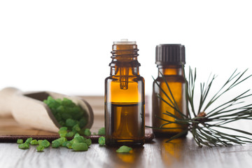 Pine essential oil, sea salt with pine oil and pine twigs