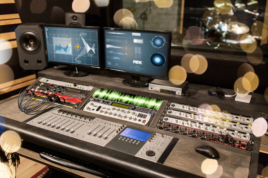 music mixing console at sound recording studio