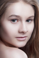 Obraz premium Blonde girl with Nude makeup and clean skin close-up