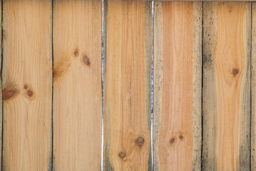 Old wooden boards. The background. Wood texture. Boards with old paint. Wooden fence.