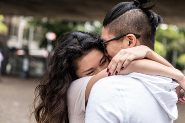 Young Asian Couple Embracing