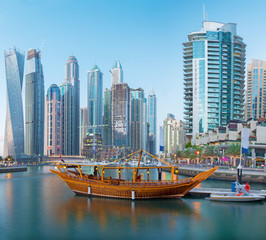 Fototapeta na wymiar Dubai - The skyscrapers of Marina and the boats