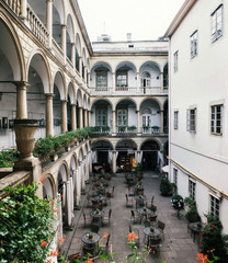 Italian courtyard with arcade of Korniakt palace or kamienica Krolewska in Lviv, Ukraine © bortnikau