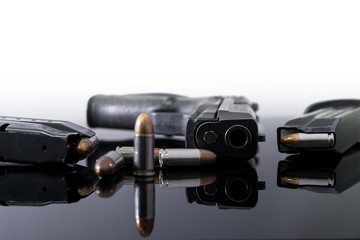 9mm Pistol gun with ammunition, Bullets and magazine on white background. Gun isolated.