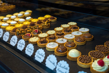 Fruit, berry and choclate tartlets dessert pastries.