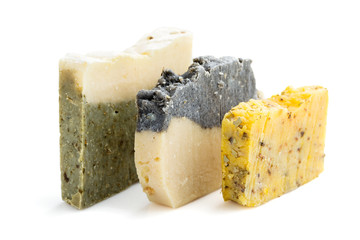 Bars of natural organic soap isolated on white