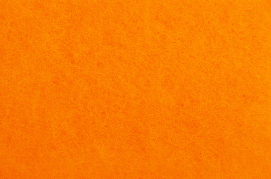 A Close Up Of Orange Felt Material Background.