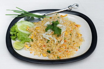 Crab Fried Rice in white dish on table.