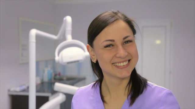 Girl dentist in the office
