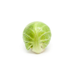 A peeled Brussels sprout isolated on a white background.