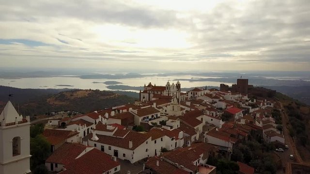 Historic Monsaraz on the hill by lake in Alentejo, Portugal