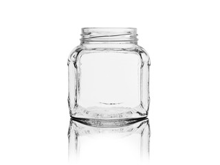 empty glass jar for canned food and jam isolated on white background with reflection